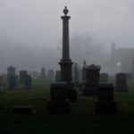 Dark, foggy cemetery