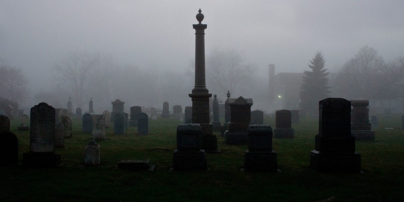 Dark, foggy cemetery
