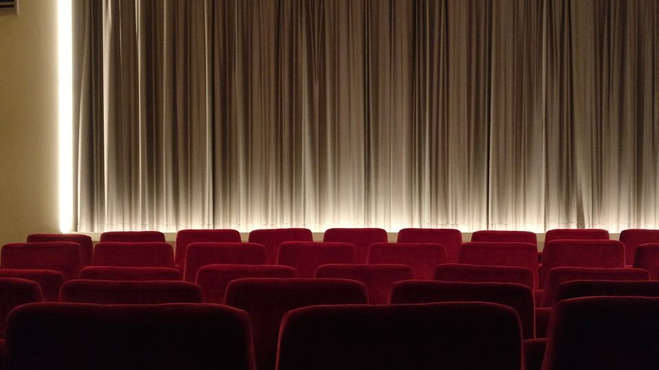 cinema curtains and red seats