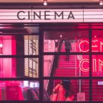 Neon pink cinema entrance