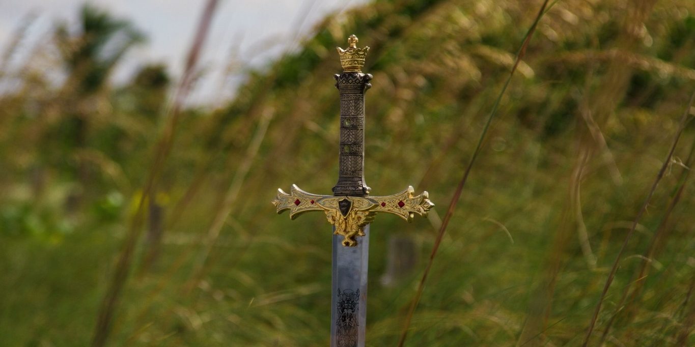 Medieval sword in grass