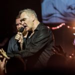 Morrissey on dark lit stage