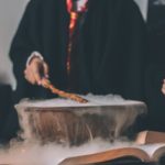 Harry Potter scene with wand over cauldron