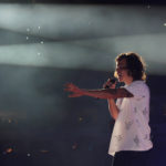 Harry Styles performing onstage