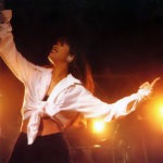 Selena singing on stage