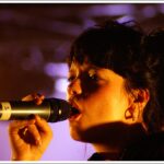 Singer Lily Allen is pictured singing on stage