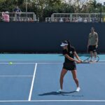 Raducanu with coach Torben Beltz in practice at the 2022 Miami Open prior to her match