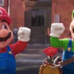 Mario and Luigi standing next to each other