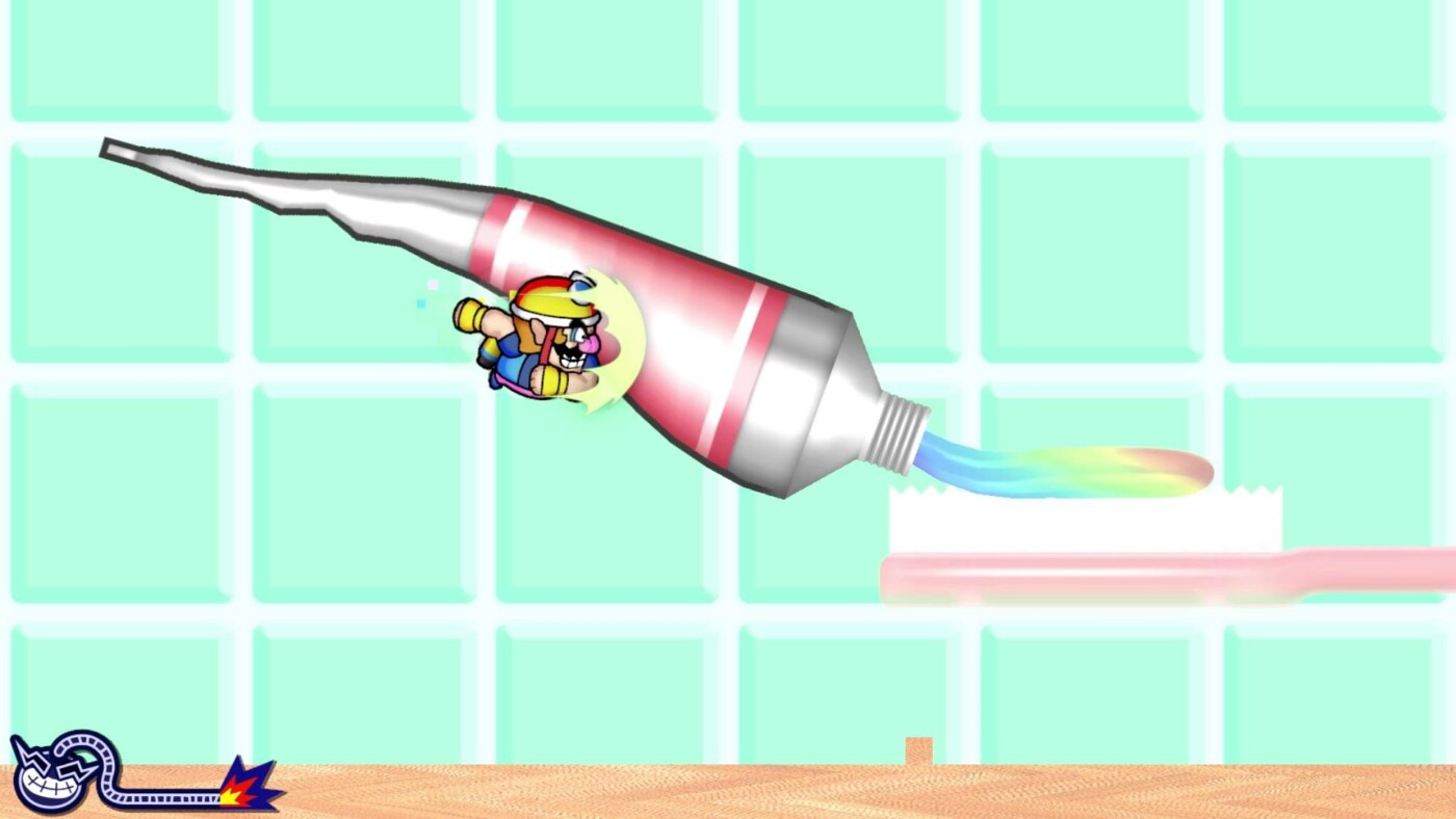 a small cartoon man crashing into a tube of toothpaste