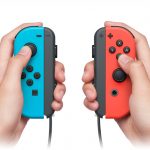Two Joy-Cons in a pair of hands