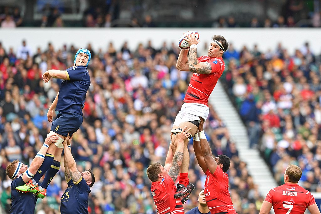 Rugby Players jumping for ball
