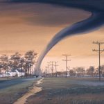 Tornado passing through a quiet town.