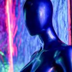 Side view of a black mannequin with purple, red, blue and green light behind it. Some reflection of purple light on the mannequin itself.