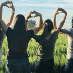 Girls in field/ Image: Melissa Askew/ Unsplash