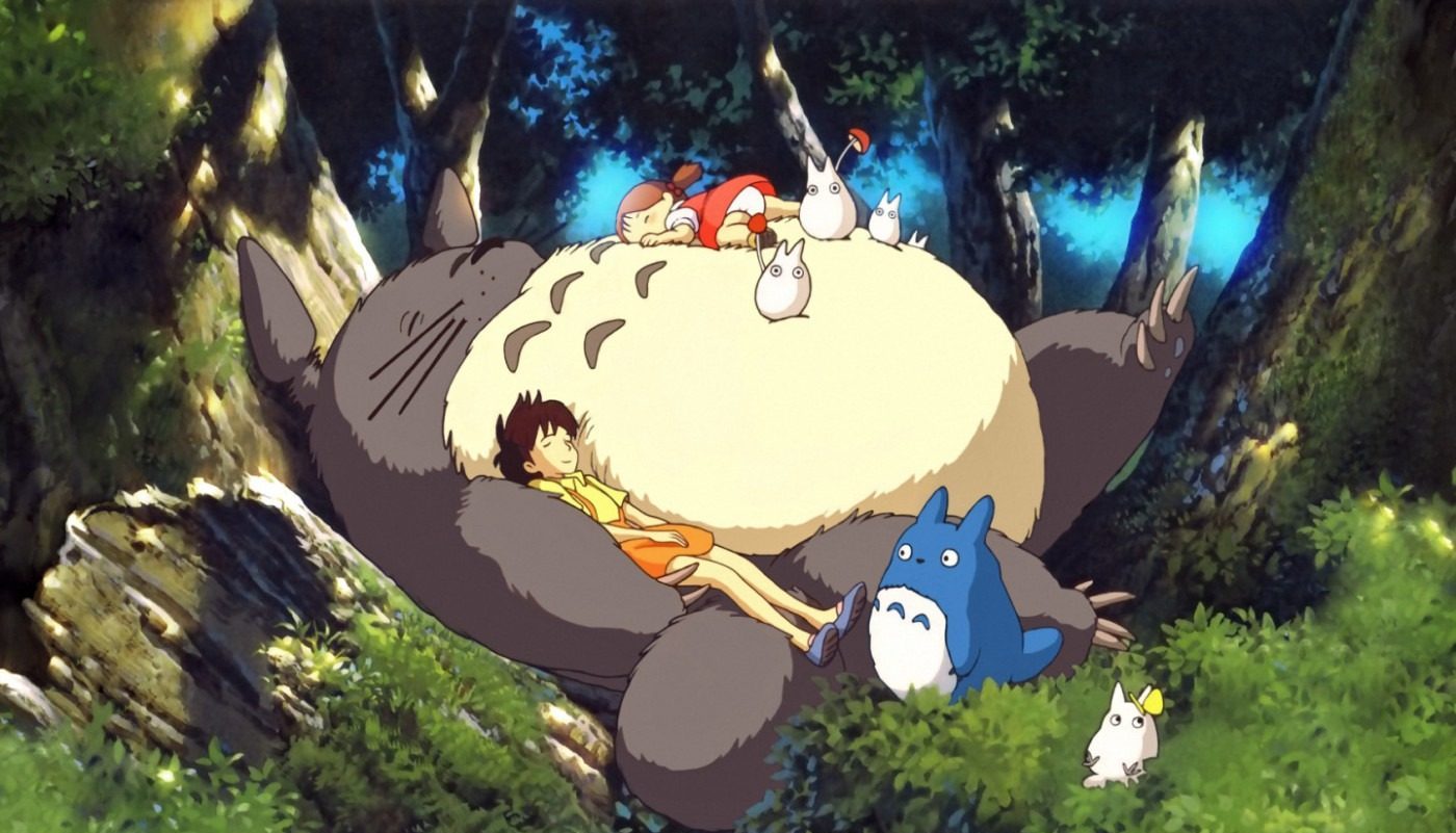 Totoro sleeping on the roots of a tree with all the children and other characters sleeping on and around him.