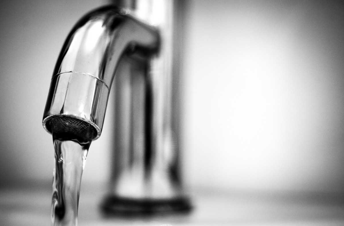 A close-up image of a running tap.