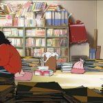 Anime film still of a girl sitting drawing at her desk in a cluttered room full of books