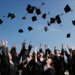 University students celebrating graduation.