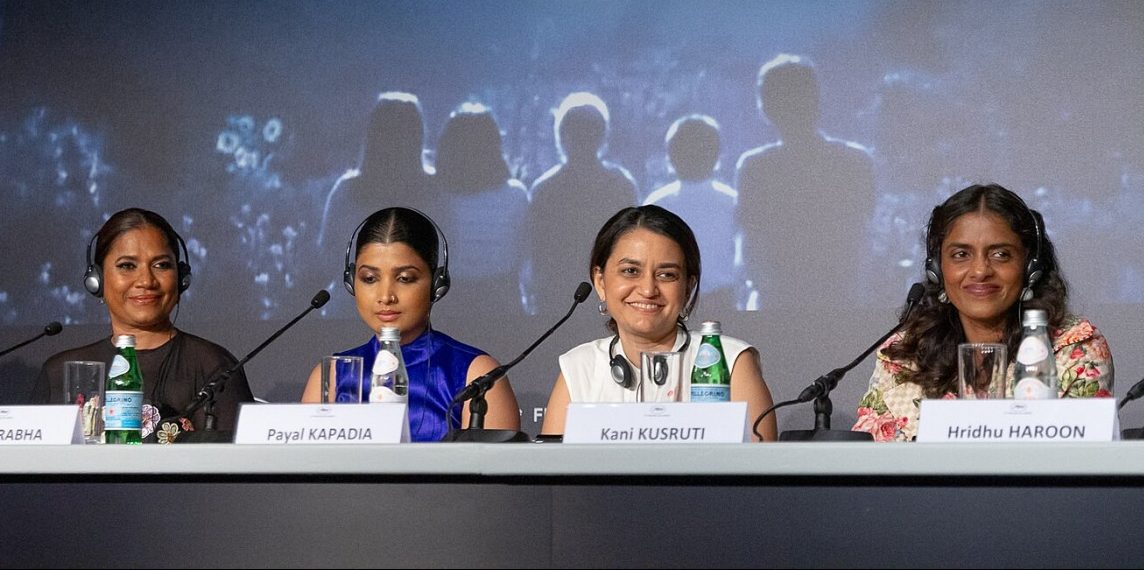 Indian film director Payal Kapdia and her group of actors sit for a panel at a Cannes film festival press conference