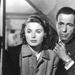 Ingrid Bergman and Humphrey Bogart staring out of a window in a still from Casablanca.