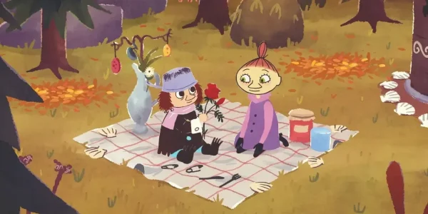 snufkin characters on a picnic blanket with flowers