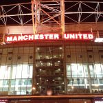 Manchester United old trafford stadium frontage at night
