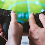people with gaming controllers