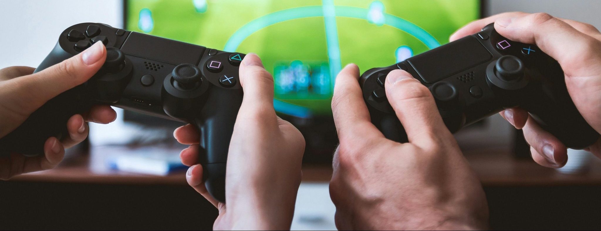 people with gaming controllers
