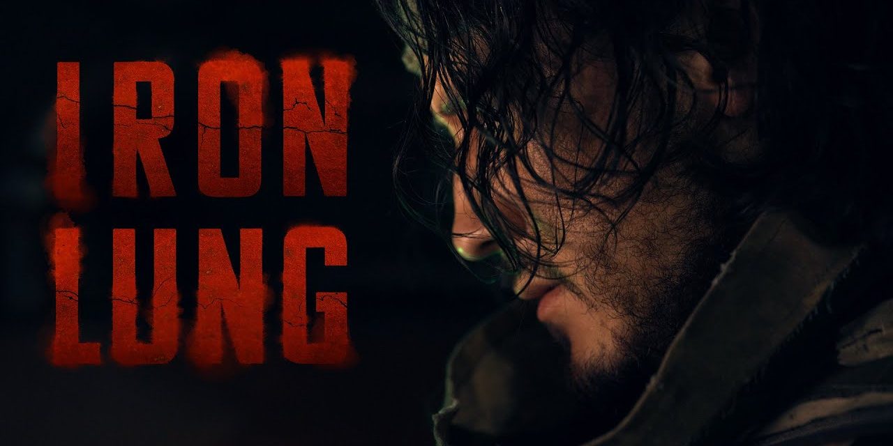 Image of side profile of Mark in IRON LUNG with IRON LUNG written on the side