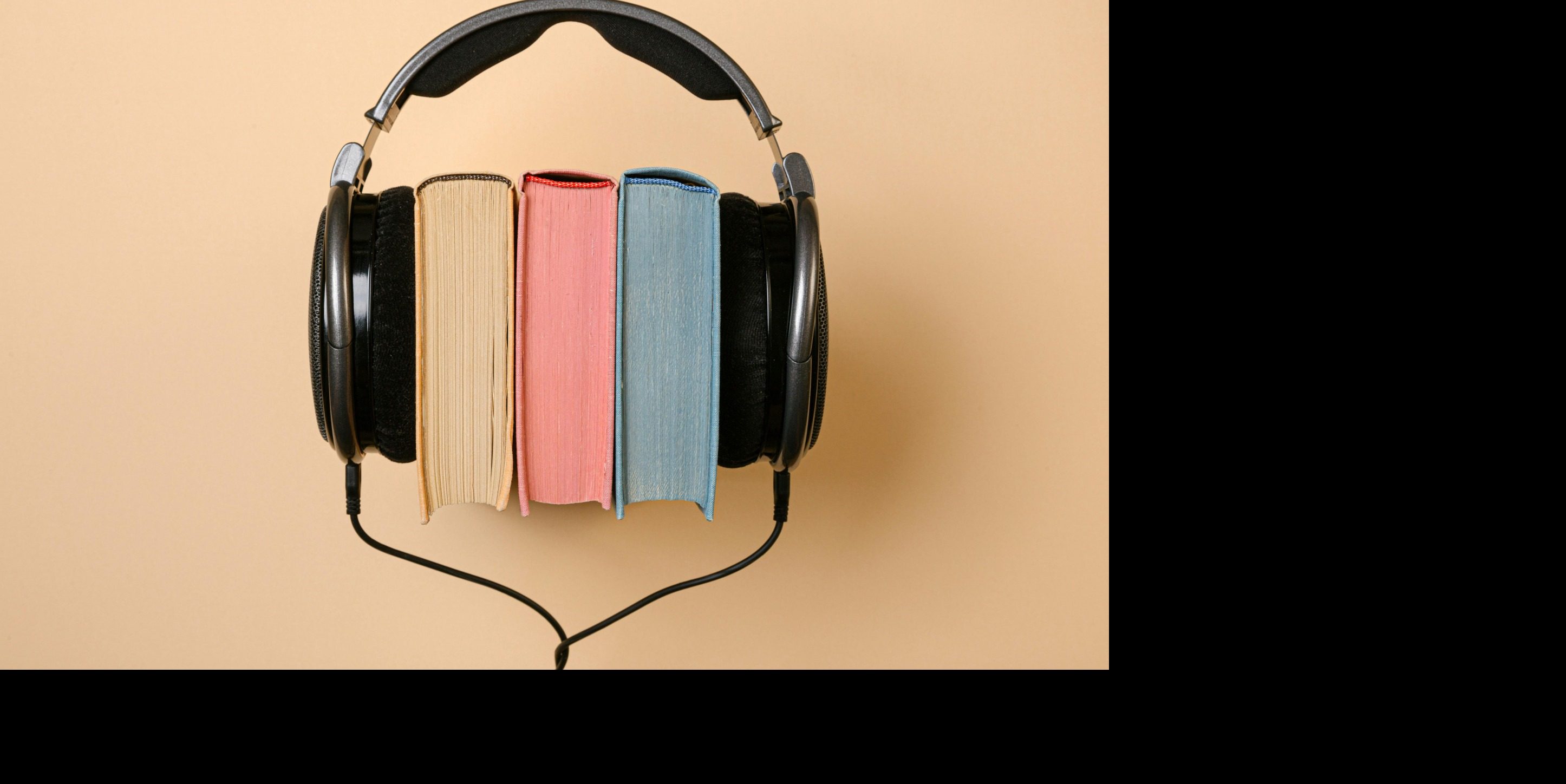 Headphones over books