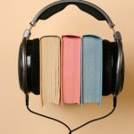 Headphones over books