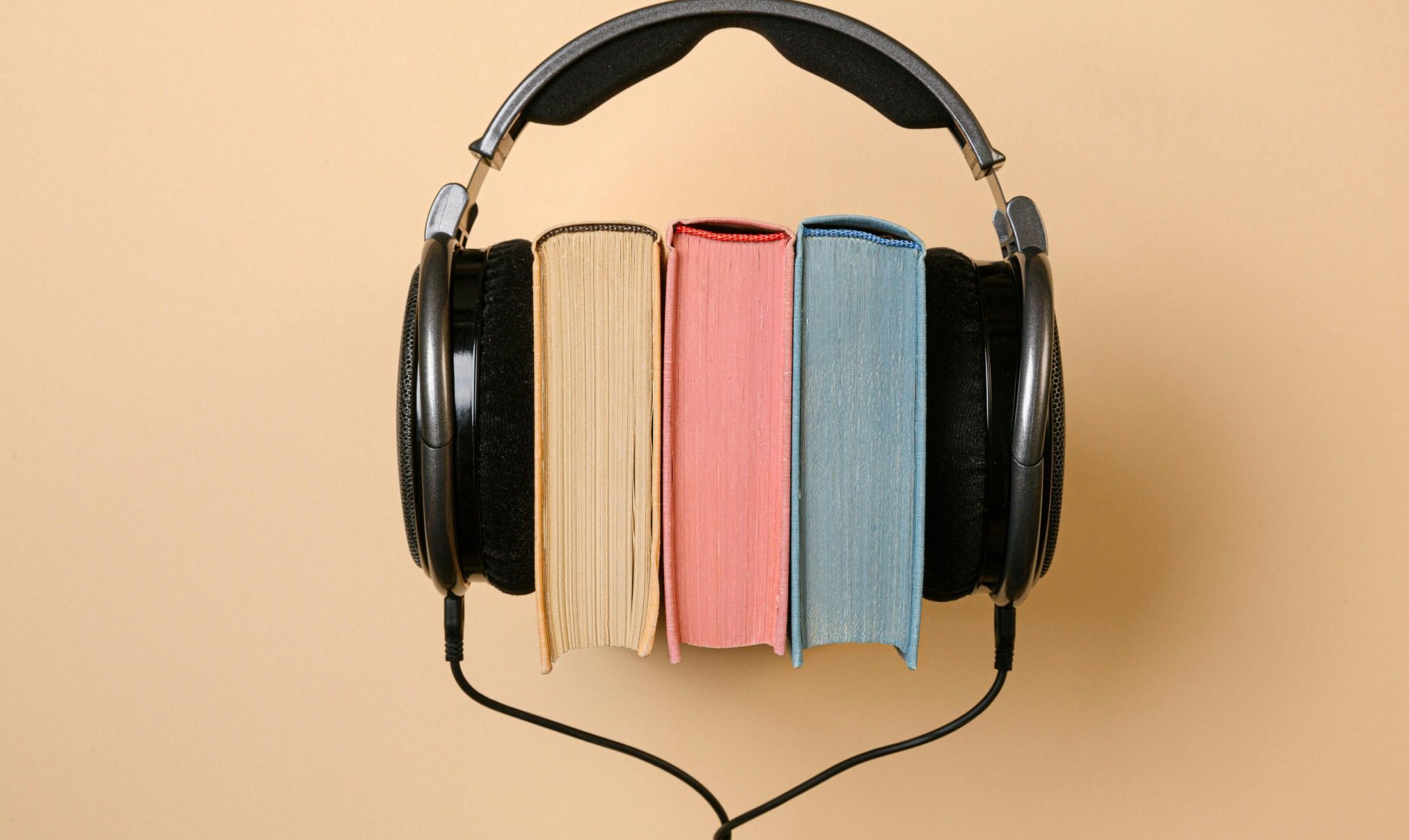 Headphones over books