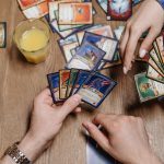 overhead shot of group playing card game