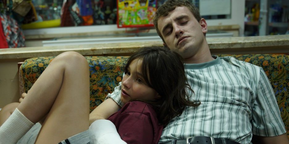 Aftersun: father and daughter asleep on sofa