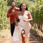 Halle Bailey and Rege Jean Page in You, Me & Tuscany, running together