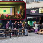 Background: exterior of Mockingbird Cafe Birmingham, Overlay: image of screening / Q&A