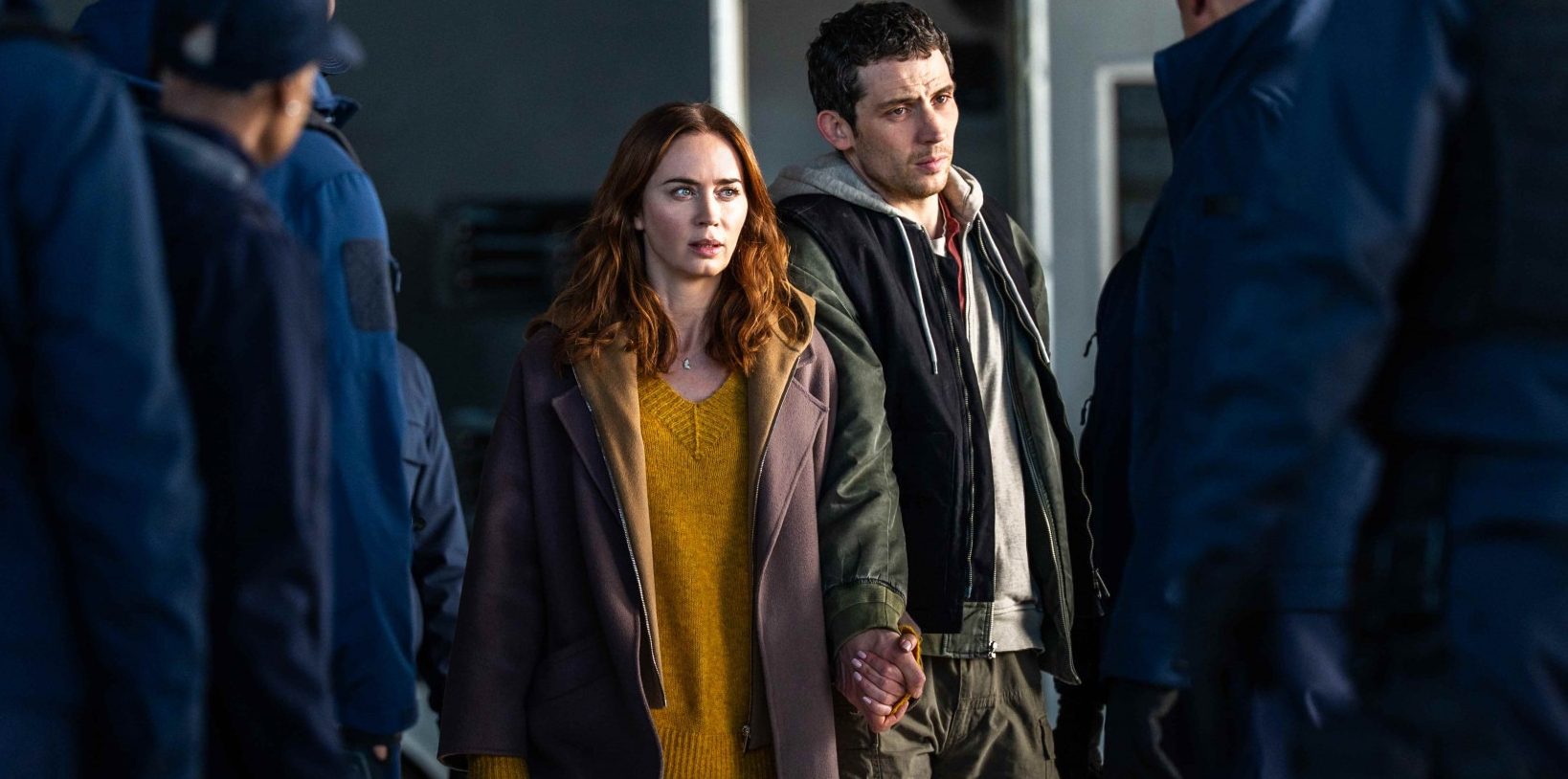 Center L to R: Emily Blunt and Josh O'Connor in DISCLOSURE DAY, directed by Steven Spielberg.